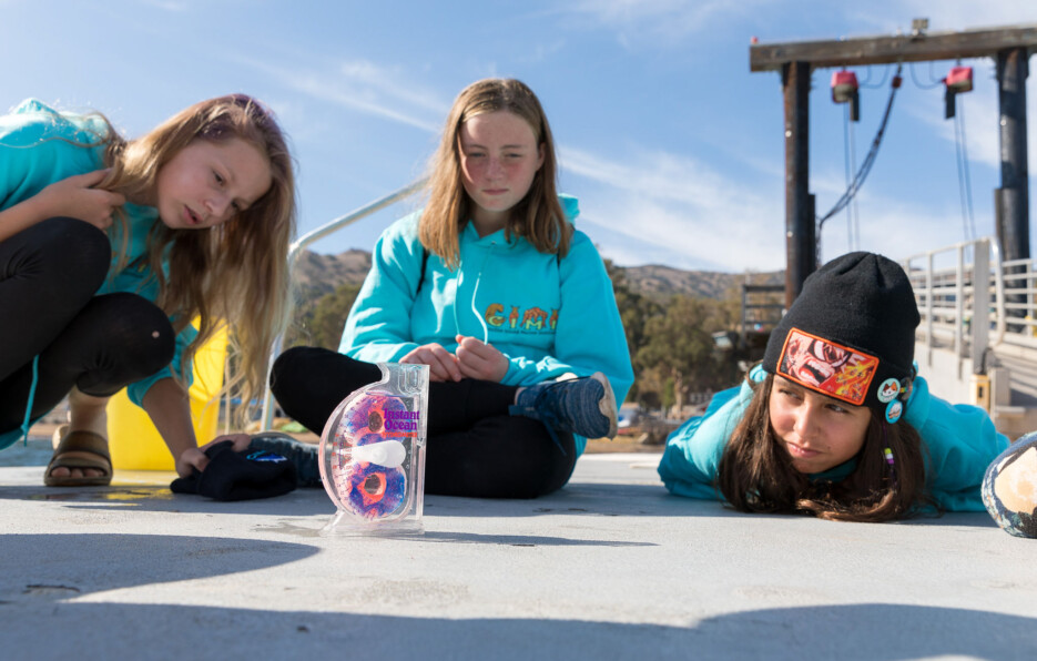 Kids doing science experiment.