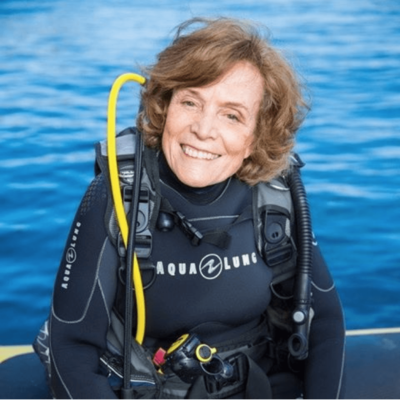 Woman with scuba gear on.